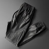 Thoshine-pantalones de cuero para hombre, pantalón de alta calidad, con cintura elástica, con bolsillo para motocicleta, de piel sintética, harén
